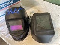 Two welding helmets