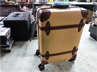 Small luggage case on wheels