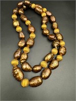 Genuine pear necklace with gold colored beads