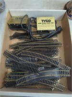 Box of HO scale vintage train track and a pair of