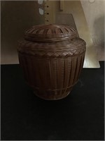 Ceramic ginger jar with rattan cover