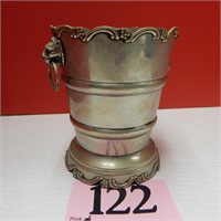 FOOTED VASE WITH LION HEAD HANDLES 7 IN