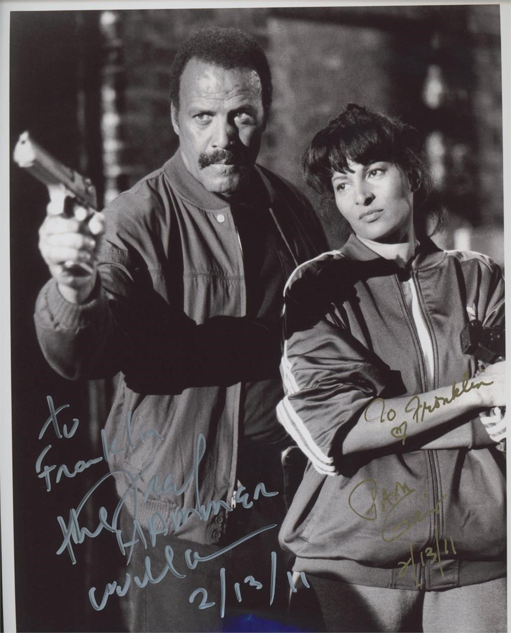 Fred "The Hammer" Williamson and Pam Grier signed