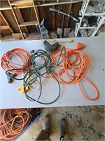 Extension cords including cordomatic