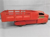 Marx stake bed truck , painted over, still says