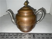 Copper and silver tea kettle