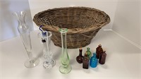 Basket of vases and miniature bottles