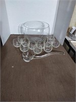 Vintage punch bowl set with 12 cups and a unique