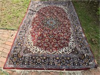 117" by 77" red multi color area rug