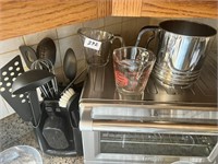 KITCHEN UTENSILS AND MEASURING CUPS AND SIFTER