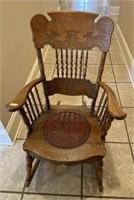 Early 1900s Pressed Back Oak Rocking Chair