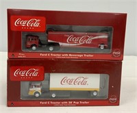 Two Coca Cola Tractor Trailers
