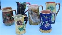 6 19TH C. MAJOLICA PITCHERS, MOST SHOW HAIRLINE