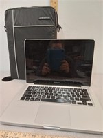 MacBook Pro with carrying case, no charger,