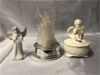 BATTERY OPERATED LIGHTED ANGEL. A PORCELAIN