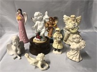 CHERUB AND ANGEL LOT.  THE ONE HOLDING THE