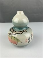 Bulbous oriental signed vase