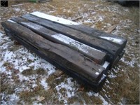 Pile of 8 railroad ties