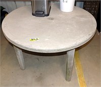 PLASTIC PATIO  TABLE AND HAS UMBRELLA  HOLE