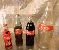 4 Coke Bottles