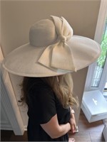 White straw hat by Kokin New York