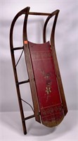 "Rosebud" sled, wooden runners have metal covers,