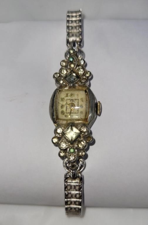 Jewel adorned female watch