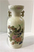 Oriental themed with peacock mantle vase, does