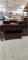 Vintage wooden dresser with dual top drawers and