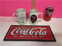 2 Christmas Coca-Cola Mugs & Little Metal Sign