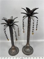 Pair of metal palm tree candlestick holders