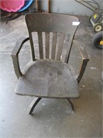 Vintage wooden swivel rocking chair