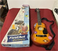 First Act acoustic guitar