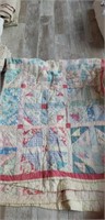 Vintage hand pieced and quilted quilt
About full