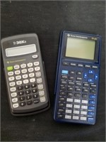 Two Texas Instruments scientific calculators