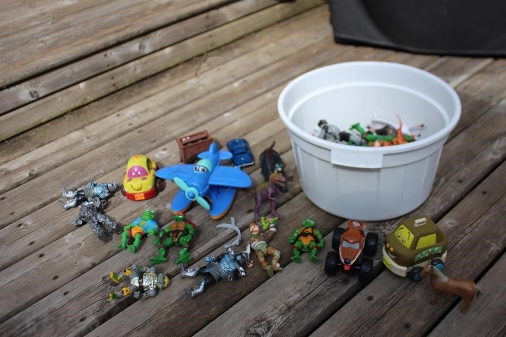 Toy lot in bucket, dinosaurs, action figures,
