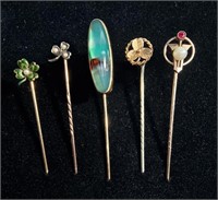 COLLECTION OF FIVE STICK PINS INCLUDING GOLD