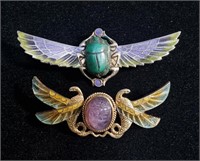 TWO SILVER SCARAB PLIQUE-A-JOUR BROOCHES