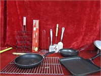 Assorted camping pans and utensils.