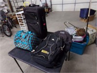2-back packs and suit cases