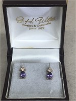 Earrings with purple stones
