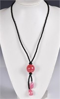 A Pink & Black Beaded Pendant Necklace
