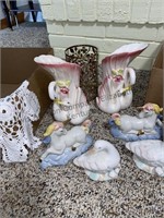 Box of home decor, swans, unicorns, candleholders