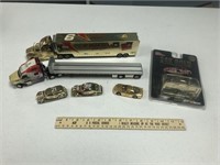 Lot of Assorted Nascar Transporters and Cars