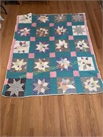 Hand stitched star and block quilt