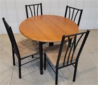 Round table 4 chairs 40" across