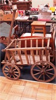 Antique wooden goat cart with wooden spokes and