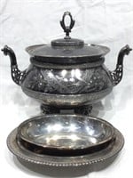 Silverplate canister and trays.