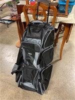 Traveling bag with handle