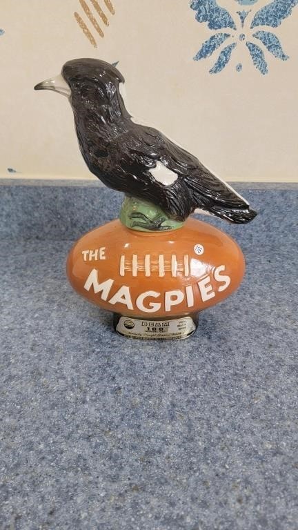 Sealed magpies jim beam bottle